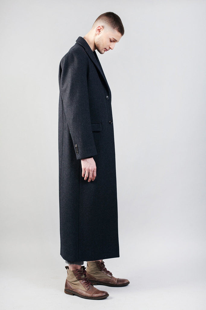 Odd Natives, The 'Bedford' overcoat is made of Italian navy wool imported from Italy, with leather detailing down the back of coat.  Fully lined with matte black buttons. Made in New York City.  Complimentary Shipping. 
